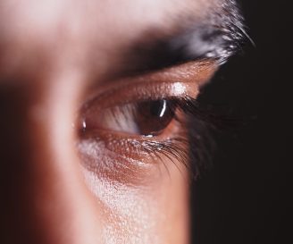 Detailed look at a person's eye showcasing depth and emotion