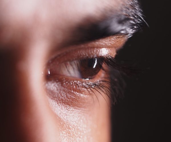 Detailed look at a person's eye showcasing depth and emotion